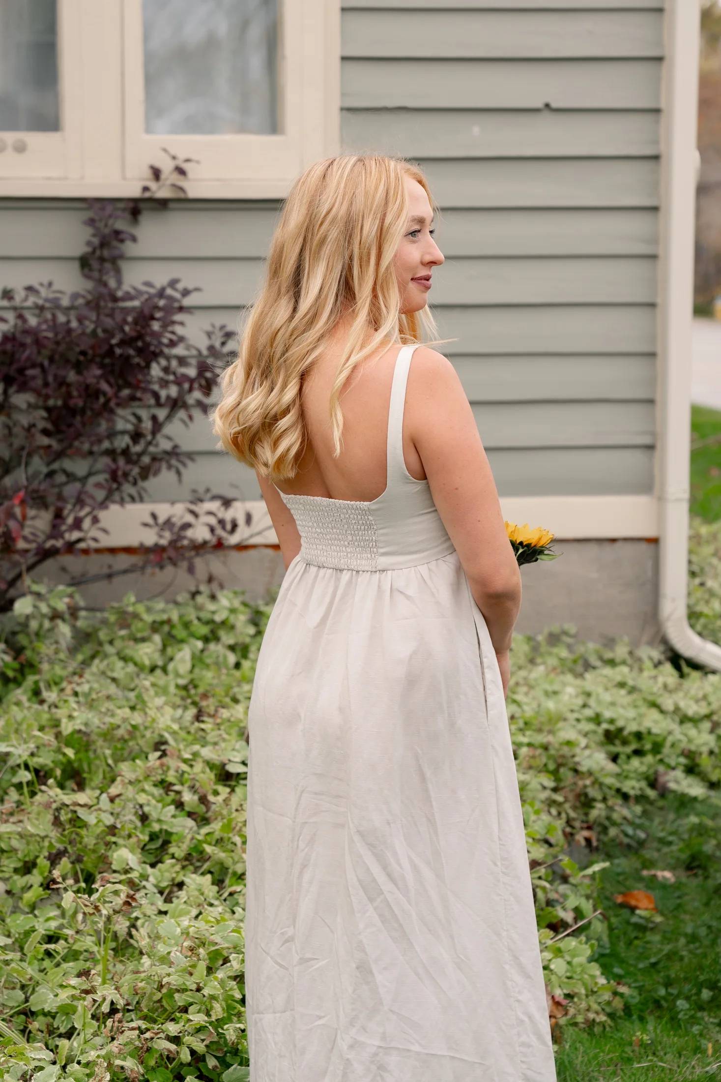 our skin-focused nutritionist holding flowers