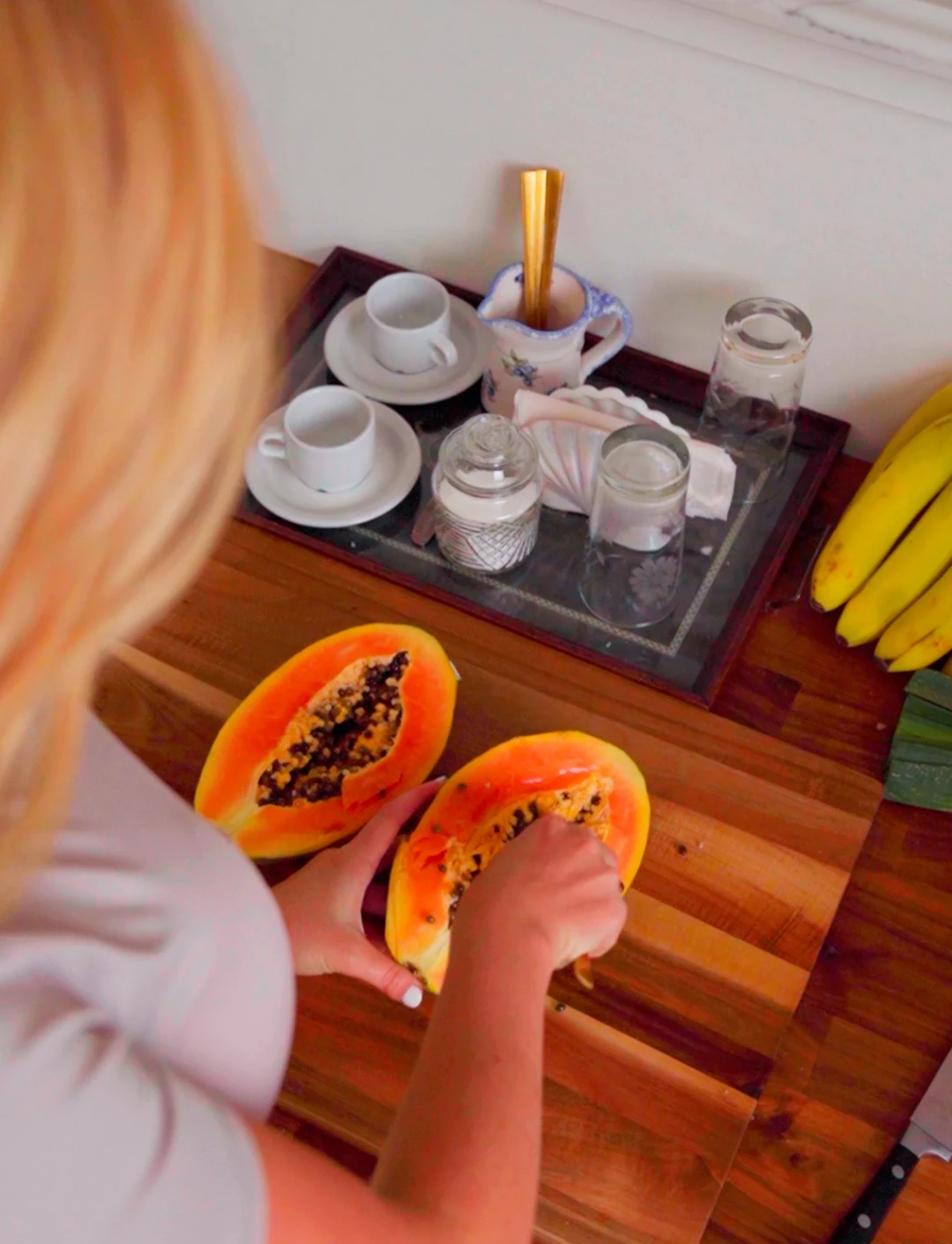 our skin-focused nutritionist scooping papaya